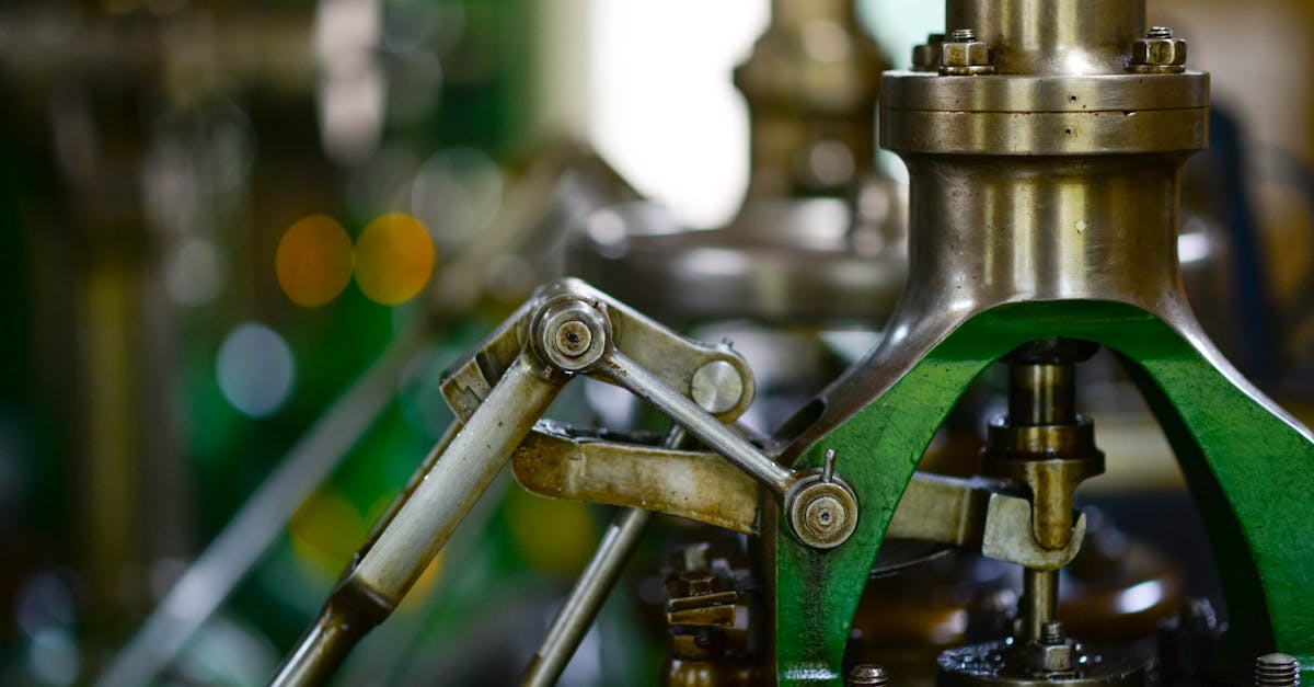 Detailed view of mechanical components in an industrial setting, showcasing metal gears and levers.