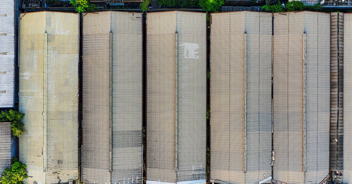 Aerial shot of large warehouses in Kecamatan Pademangan, Jakarta, showcasing industrial architecture.